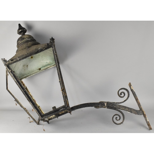 418 - A Victorian Metal Wall Lantern, 79cm high (Weathered Condition and No Glass Panels)