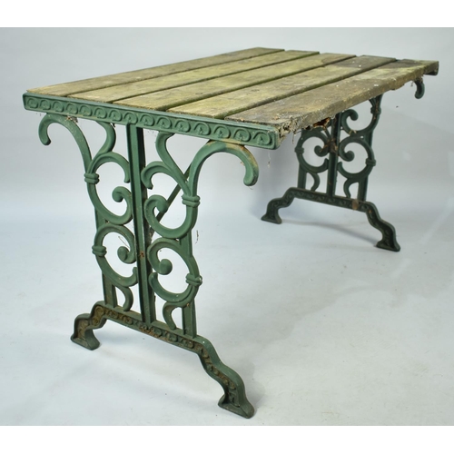 517 - A Cast Iron and Wooden Potting Table, 108x68cms