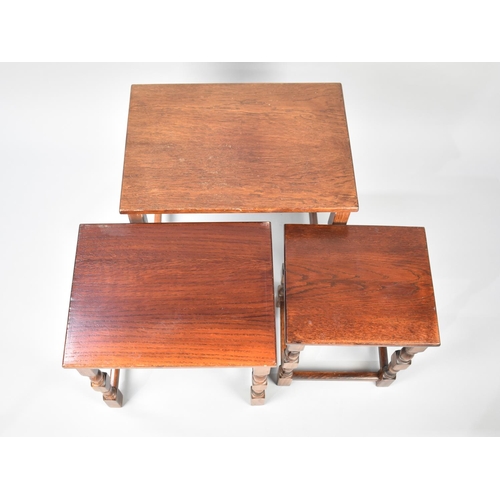 85 - A Nest of Three Mid 20th Century Oak Tables, 51cms Wide