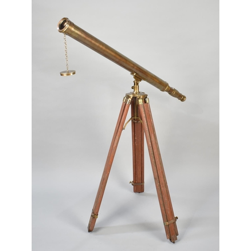 91 - A Reproduction Patinated Brass Full Size Telescope on Wooden and Brass Tripod Stand, 100cms Long