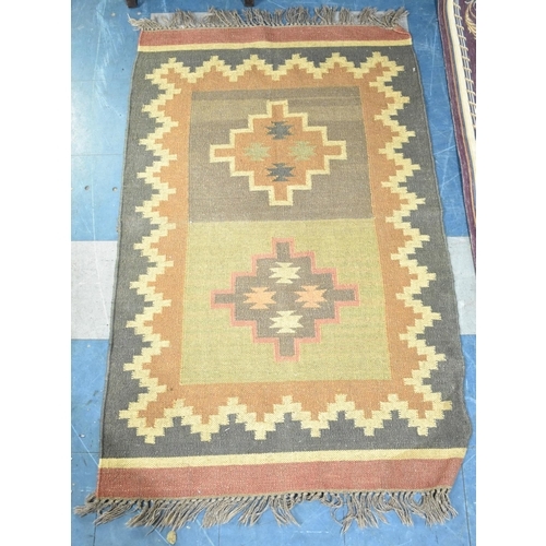 504 - A Patterned Woven Rug, 152x94cms