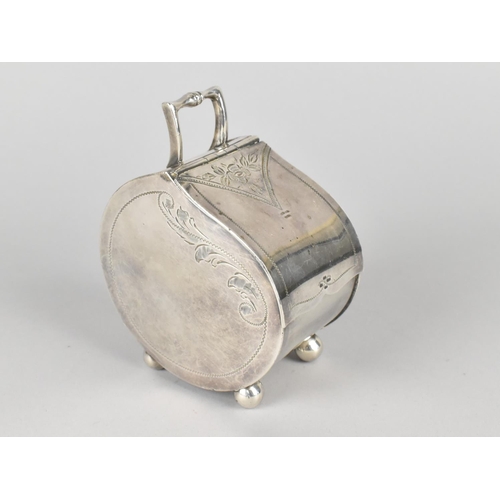 23 - A Silver Plated Lidded Sugar Bowl in the from of a Coal Scuttle, Engraved Decoration and Four Ball F... 