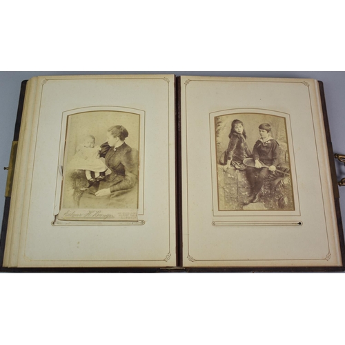 58 - A Late Victorian Photo Album with Brass Clasp Containing some Family Photographs, 28x23cm