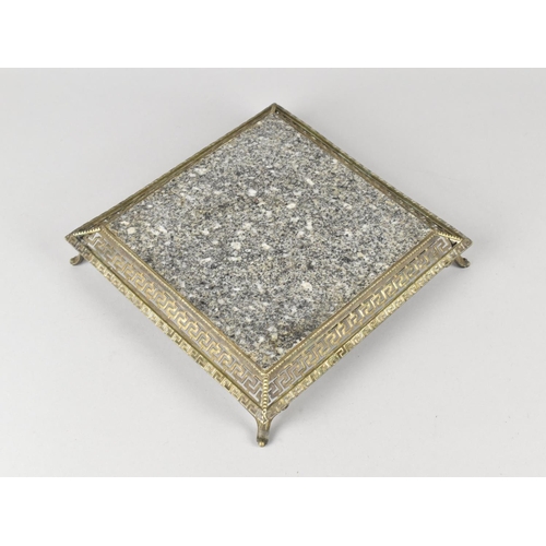 63 - A Polished Granite Teapot Stand on Reticulated Metal Base, 18.5Cm Square