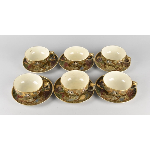 286 - A Japanese Satsuma Tea Set Comprising Six Cups and Saucers Decorated with Figures and Enriched with ... 