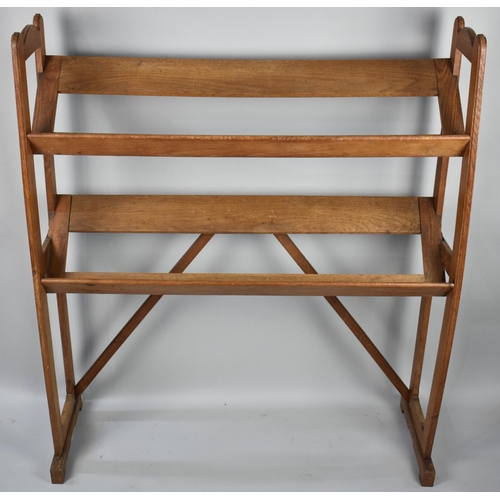 102 - An Edwardian Oak Two Tier Book stand, 96cms Wide