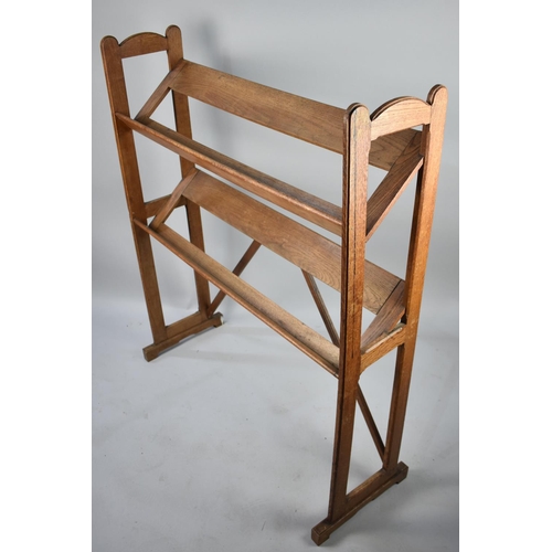 102 - An Edwardian Oak Two Tier Book stand, 96cms Wide