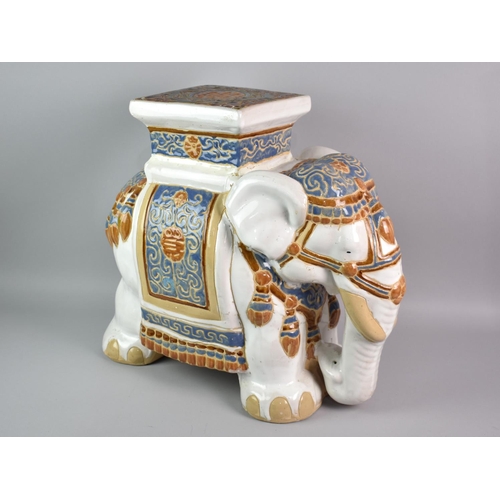 134 - A Large Indian Ceramic Stool in the Form of an Elephant, 44cms High