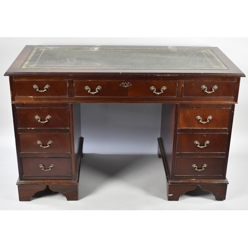 135 - A Late 20th Century Mahogany Kneehole writing Desk with Tooled Leather Top, 122cms Wide