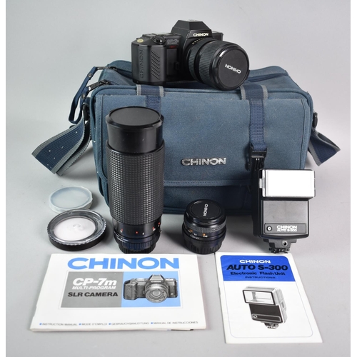 176 - A Chinon CP-7M 35mm Camera together with Fitted Canvas Carrying Bag, Lenses, FLash Gun Etc