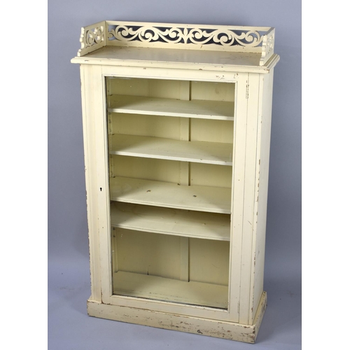 192 - A Cream Painted Glazed Four Shelf Cabinet with Pierced Galleried Top, 60cms Wide