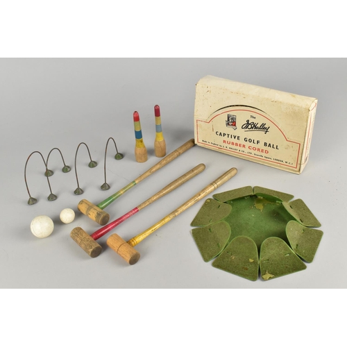 235 - A Vintage Table Croquet Game together with Captive Golf Ball in Original Box and Practice Putting Ho... 