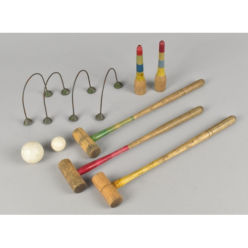 235 - A Vintage Table Croquet Game together with Captive Golf Ball in Original Box and Practice Putting Ho... 