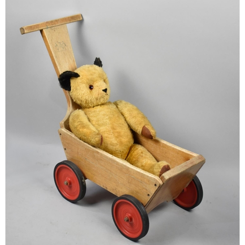 239 - A Vintage Teddy Bear, 61cms High together with a Wooden Toy Handcart by Community