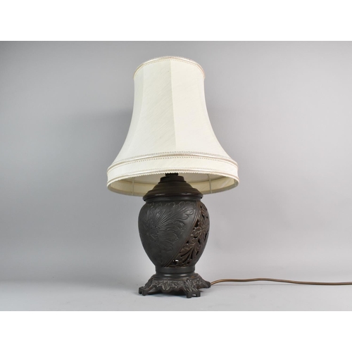 245 - A Pierced Metal Bronze Effect Table Lamp with Shade, 54cms High Overall