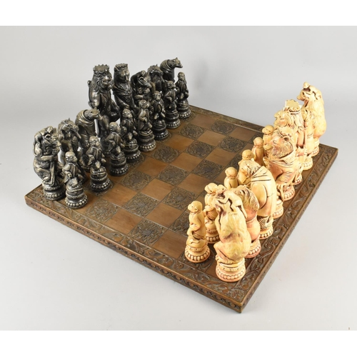 254 - A Modern Moulded Chessboard and Chess Set