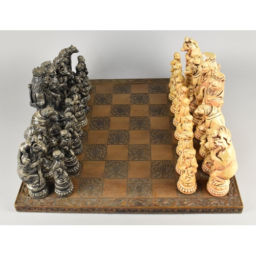 254 - A Modern Moulded Chessboard and Chess Set