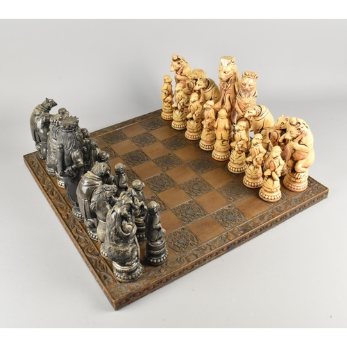 254 - A Modern Moulded Chessboard and Chess Set