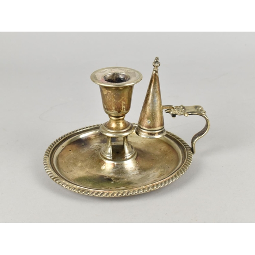 26 - A Silver Plated Bedchamber Stick with Snuffer, 15cms Diameter