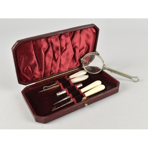 29 - A Mid 20th Century Leather Cased ladies Manicure Set together with a Pair of Silver Plated Lorgnette... 