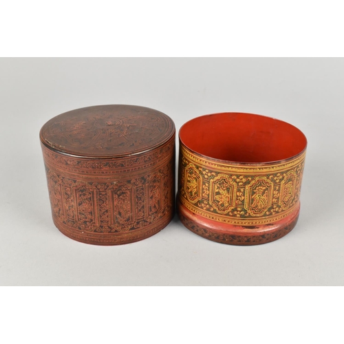 30 - A Cylindrical Lidded Thai Box in Red Lacquer with Gilt Decoration, Somewhat Faded, 10cms Diameter an... 