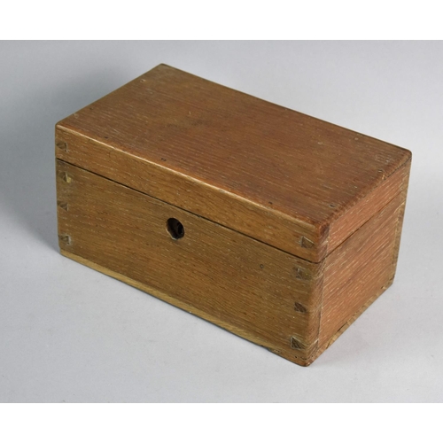 40 - An Edwardian Oak Box Containing Various Wade Whimseys