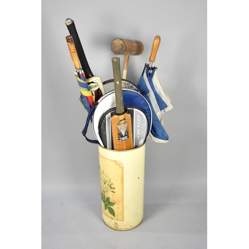 547 - A Collection of Various Tennis Rackets and Cricket Bats, Croquet Mallets Etc in Circular Stick Stand