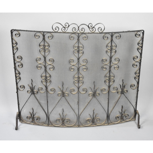 78 - A Late 20th Century Ornate Wrought Iron Fire Guard, 75cms Wide