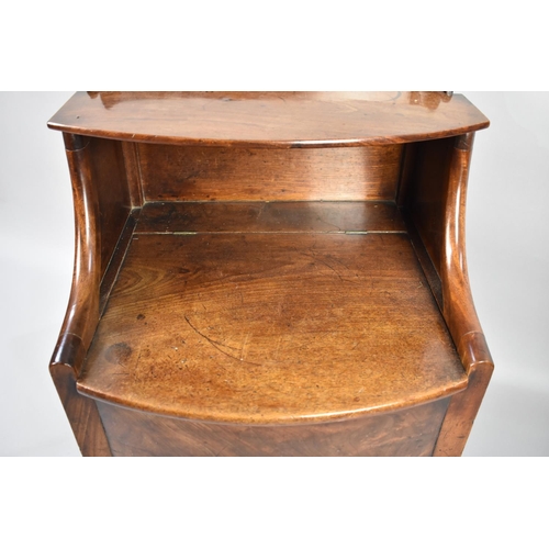 83 - A George III Mahogany Bow Fronted Commode Stool with Hinged Top, 57cms Wide and 77cms High