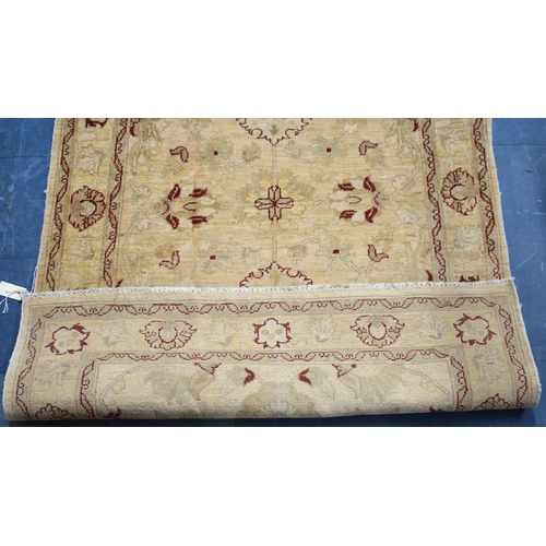 427 - A Hand Made Ziegler Rug, 180x120cms