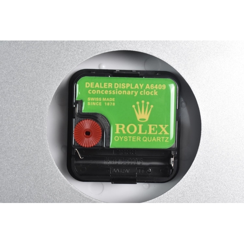 123 - A Circular Officially Licensed Rolex Dealership Wall Clock with Battery Movement, 34cms Diameter