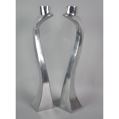 132 - A Pair of Modernist Cast Aluminium Candlesticks Designed by Mathew Hilton, 30cms High