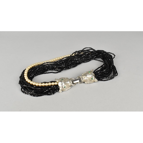 235 - A Vintage Multistrand Necklace having Black Glass and Faux Pearl Beads and Good Quality White Metal ... 