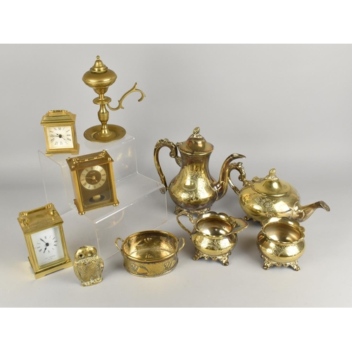 305 - A Collection of Various Metalwares to Comprise Brass Mantle Clocks, Oil Lamp Burner, Four Piece Tea ... 