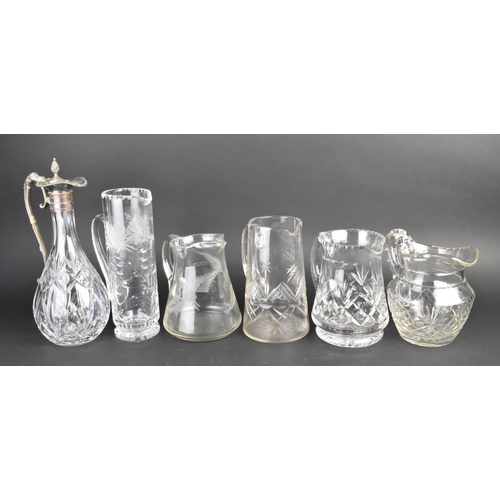 313 - A Collection of Various Glass Jugs to Include Silver Plate Mounted Claret Jug