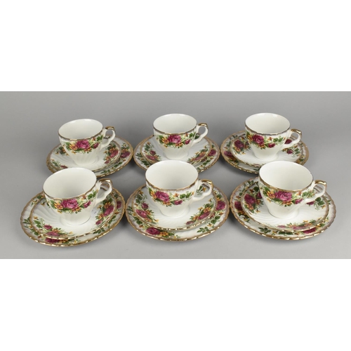 317 - An English Rose Pattern Tea Set for Six