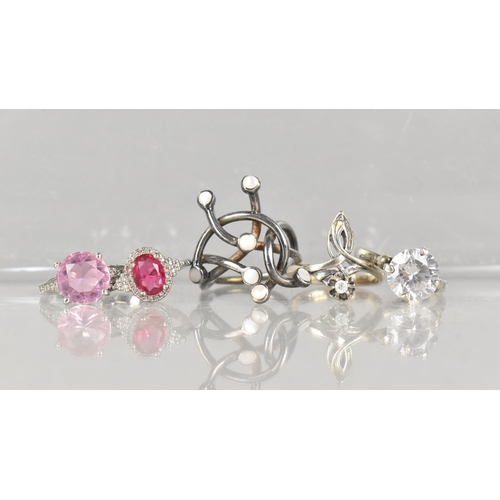 356 - A Collection of Five Jewelled Silver and White Metal Rings