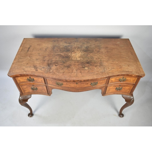 431 - An Edwardian Serpentine Front Ladies Writing Desk with Crossbanded Top, Centre Long Drawer Flanked b... 