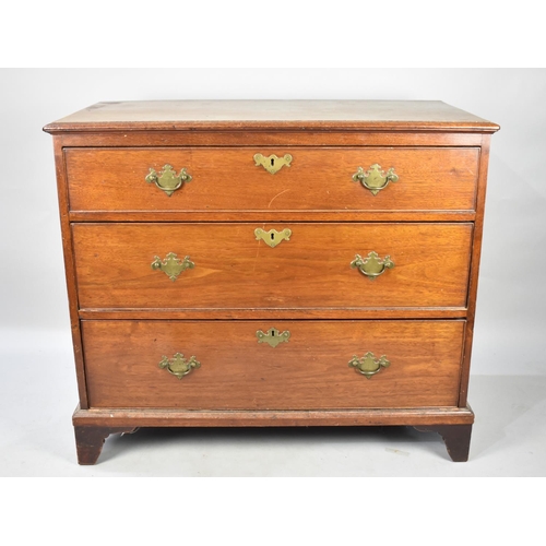 435 - An Edwardian Mahogany Chest of Three Long Drawers on Bracket Feet, Top Drawer Fitted, 103cms Wide