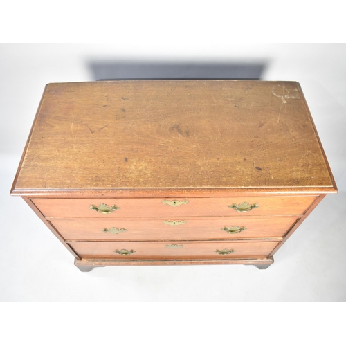 435 - An Edwardian Mahogany Chest of Three Long Drawers on Bracket Feet, Top Drawer Fitted, 103cms Wide