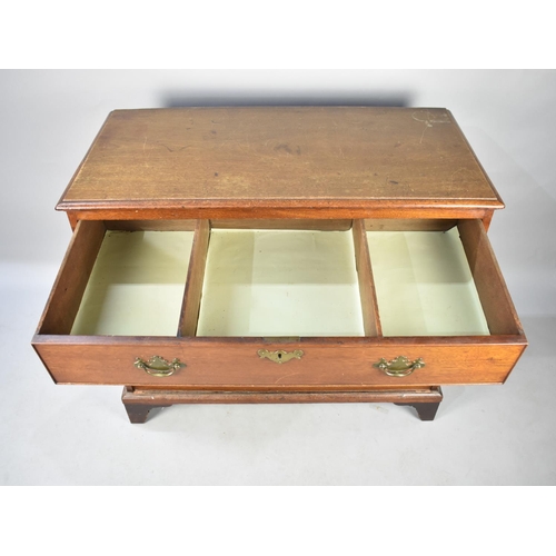 435 - An Edwardian Mahogany Chest of Three Long Drawers on Bracket Feet, Top Drawer Fitted, 103cms Wide