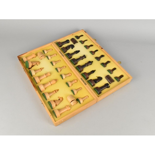 50 - A Late 20th Century Travelling Chess and Draughts Set in Folding Box, 32.5cms Wide