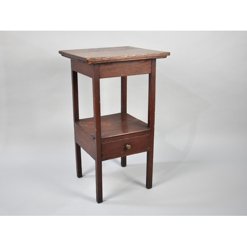 62 - An Edwardian Square Topped Occasional Table with Base Drawer, 40cms Square and 70cms High