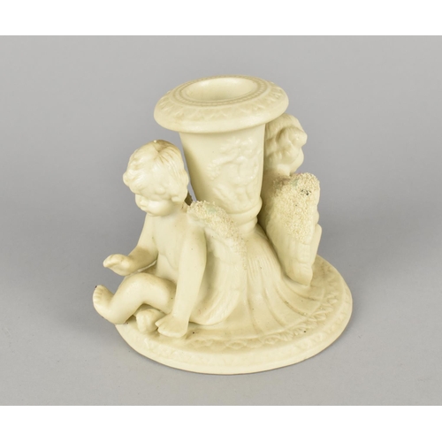 70 - A Moulded Parian Style Candlestick Decorated with Two Seated Cherubs, 9cms High