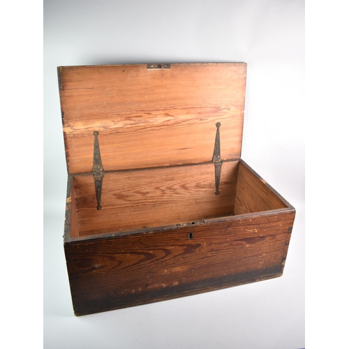 94 - A Stained Pine Box with Iron Carrying Handles, 66cms Wide