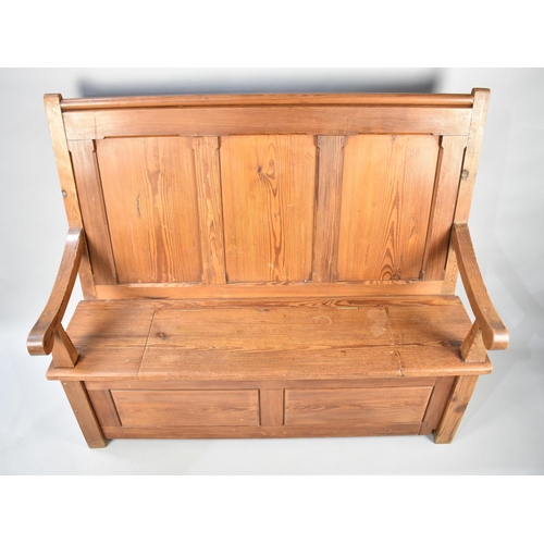 99 - A Late Victorian/Edwardian Pitch Pine Three Panel Settle with Scrolled Arms, 141cms Wide