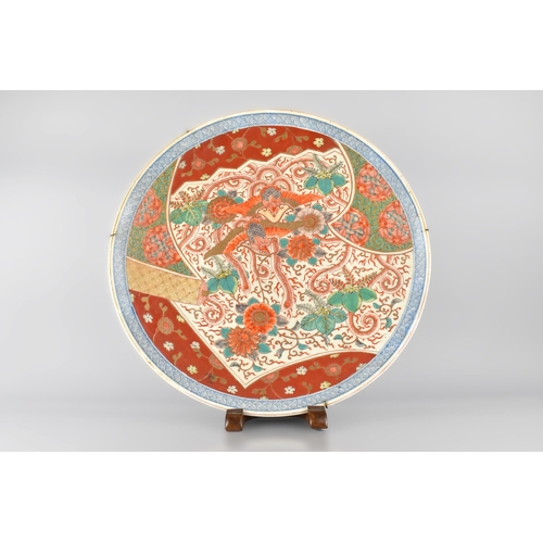 192 - A Large Japanese Meiji Period Porcelain Charger Decorated in the Imari Palette with Phoenix Motif, B... 