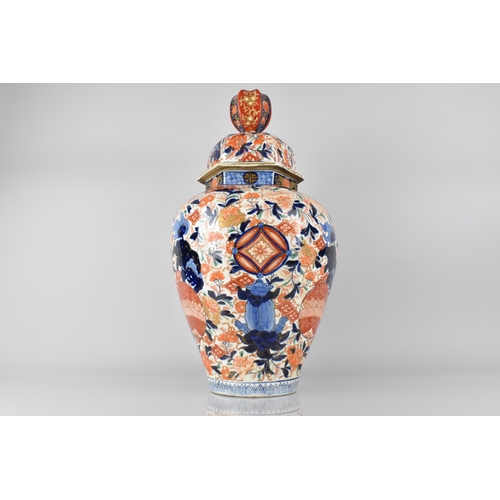 196 - A Large Japanese Meiji Period Porcelain Baluster Vase and Cover Decorated in the Imari with Temple L... 