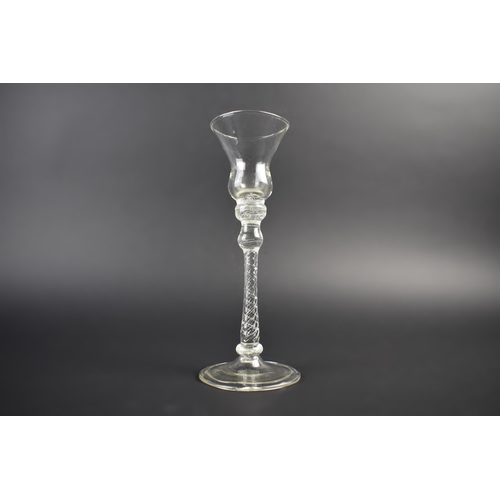 168 - An 18th Century Air Twist Stemmed Drinking Glass with Folded Foot Having Later Bell Bowl, 21cm high