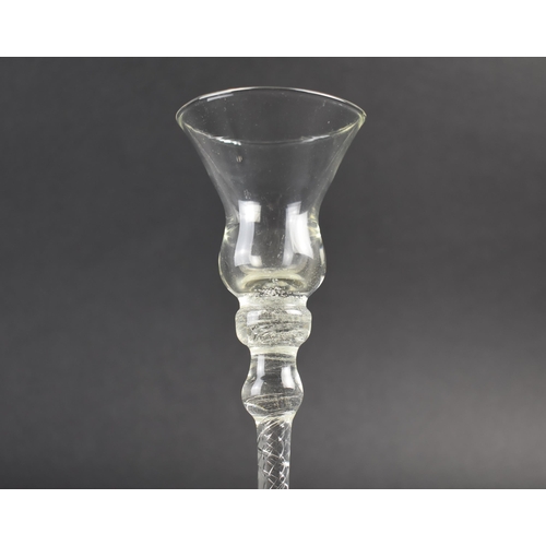 168 - An 18th Century Air Twist Stemmed Drinking Glass with Folded Foot Having Later Bell Bowl, 21cm high